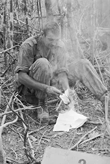 Sergeant Prints: American Soldier Burning His Mail In Vietnam