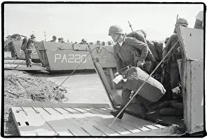 Disembarking Prints: American Soldier Disembarking On Beach