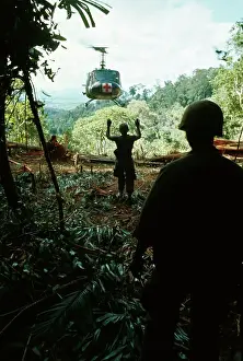 Da Nang Prints: American Soldier Guiding Helicopter for Takeoff