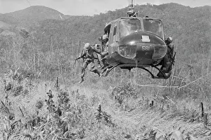 Province Prints: American Soldiers Jumping from Helicopter in South Vietnam
