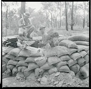 American Soldiers Behind Sand Bags