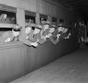 Penn Station: Echoes of Transit: American Troops Leaning from Train Window En Route to Camp
