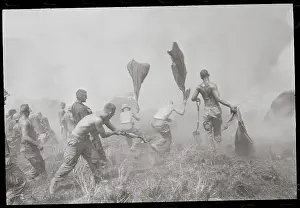 American Troops Putting out Field Fire