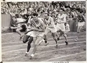 Relay Racer Prints: Americans Handing Off During Meter Race