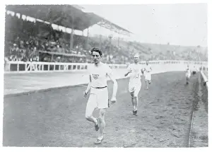 Prints of (Original Caption). Olympic Games, London, England 1908- 1500 meter flat race, 1st heat, J. Sullivan, U.S.A 1st and J.D. Lightbody, U.S.A 2nd Capturing Glory: A Journey Through Olympic History: Americans Running in Race