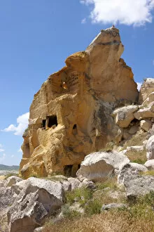 Ancient cave houses in volcanic tuft rock formations, Love Valley, Goreme National Park, Cappadocia, Nevsehir Province