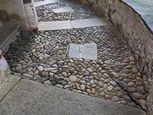 Images Dated 14th April 2016: Ancient Man Made Cobblestone Pavement, Lake Orta, Northern Italy