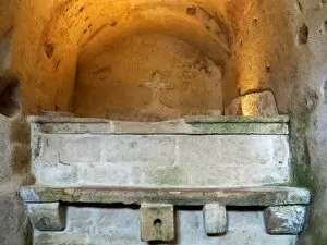 Images Dated 18th August 2016: Ancient Sarcophagus In A Rock Church In Sassi di Matera, Basilicata, Southern Italy