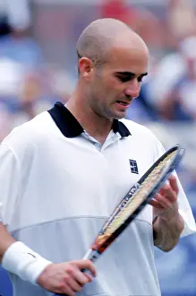 Prints of NEW YORK - CIRCA 1999: Andre Agassi plays tennis at the US Open circa 1999 in New York City. (Photo by PL Gould/Images/Getty Images) The Grand Slam Gallery: Andre Agassi