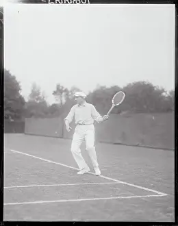 Andre Gobert Swinging His Tennis Racquet
