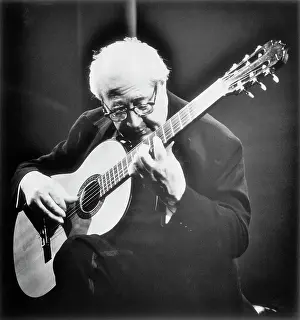 Andres Segovia Playing Guitar