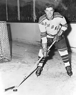 Andy Bathgate Posing in Hockey Gear