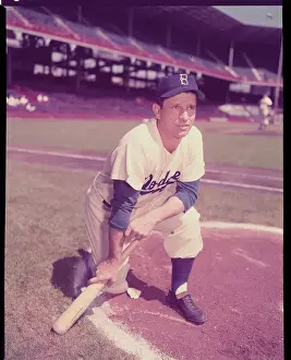 Andy Pafko Kneeling with Baseball Bat
