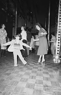 Angelo Duvall Dancing at Studio 54 with Young Woman