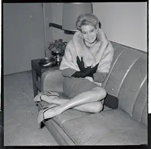 Angie Dickinson with Her Legs up on Couch