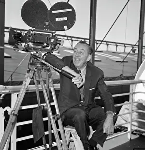 Animator Walt Disney with Movie Camera