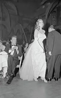 Strapless Prints: Anita Ekberg Walking Across Room