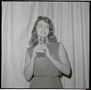 Ann-Margret Holding Her Award