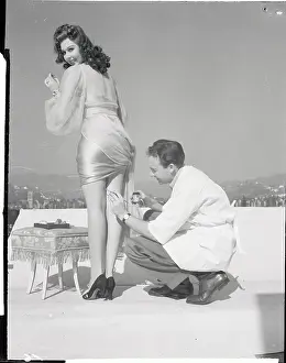 Ann Miller Having Stockings Applied