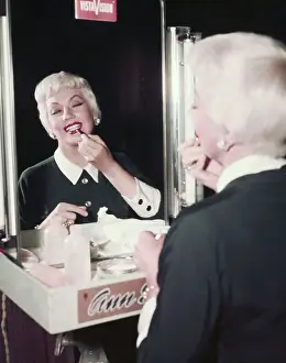 Ann Sothern Making up Her Face