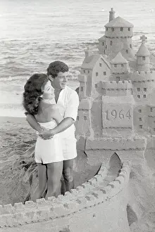 Annette Funicello and Frankie Avalon Hugging by Sandcastle