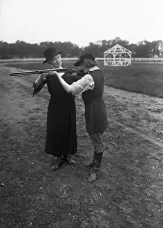 Mineola Prints: Annie Oakley Instructing Colleague How to Shoot