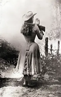 Stunt Prints: Annie Oakley Shooting Over Shoulder