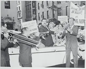 Announcer with Comedian Jackie Gleason and Cast Leaving for Station