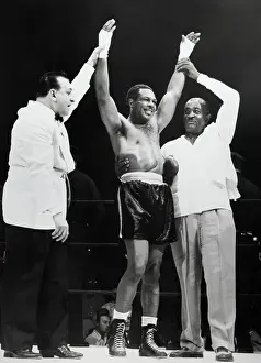 Announcer Prints: Announcer Raises Archie Moore's Arm