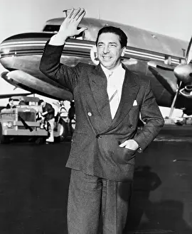 Passenger Airplane Prints: Annunzio Mantovani Arriving in New York