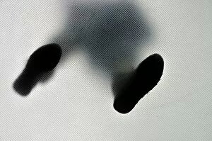 Images Dated 30th May 2012: Anonymous person standing with feet wide apart, from below