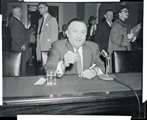 Anthony Doria Sitting at Desk