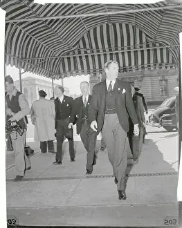Anthony Eden Walking Under Outside Canopy