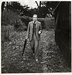 Anthony Eden Walking Outside His Home