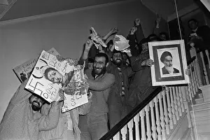 Anti-Shah Protesters Ripping Pictures
