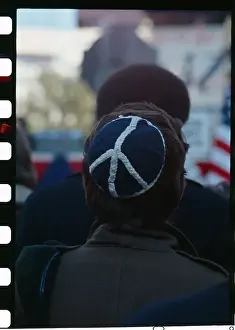 Anti-War Demonstrator Wearing Peace Hat