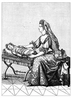 Images Dated 23rd March 2016: Antique illustration of woman changing baby
