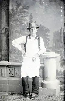 Time Captured: Vintage Art: Antique tintype studio portrait of man wearing butcher apron