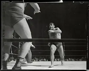 Antonio Rocca Preparing to Wrestle Leslie Carlton