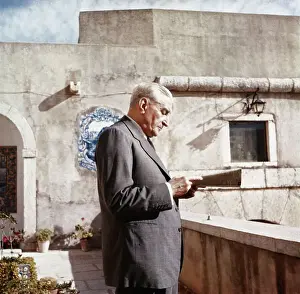 Antonio Salazar reading Newspaper