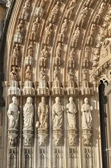 Hand Prints: Apostle statues on the Gothic portal of the basilica