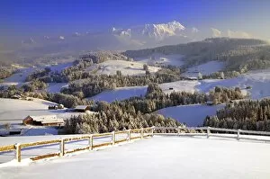 Appenzeller winter landscape in evening light with view on the Santis, Appenzell, Switzerland