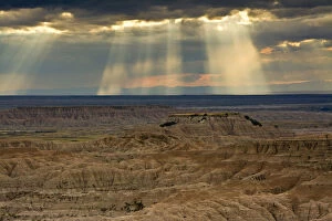 Images Dated 15th September 2016: Approaching storm and sunbeams, Badlands National Park, South Dakota, USA