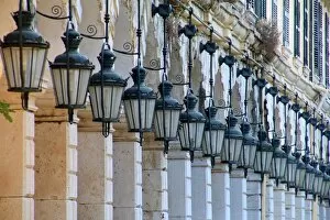 The arcades and traditional lanterns of the famous Liston at the Spianada in Kerkyra, Corfu Town, Greece
