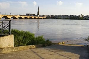 Images Dated 9th June 2006: Arch bridge across a river, Pont De Pierre, St. Michel Basilica, Garonne River, Bordeaux