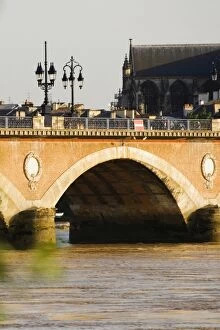 Images Dated 9th June 2006: Arch bridge across a river, Pont De Pierre, St. Michel Basilica, Garonne River, Bordeaux