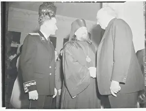 Archbishop Alexei and Tom Connelly Shaking Hands