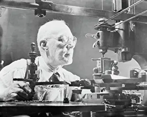 Artisanship Prints: Archibald Smith Operating Machine