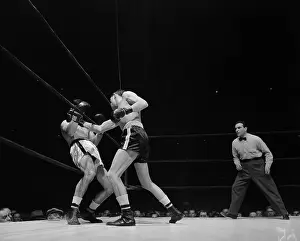 Archie Devino Boxing Against Ray Famechon