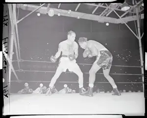 Archie Moore Blocking a Punch
